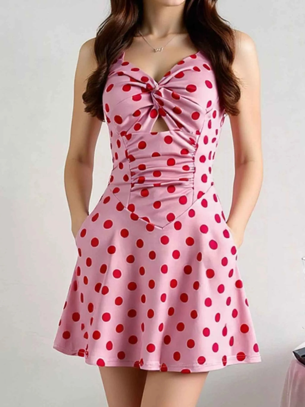 Polka Dot Halter Neck Mini Dress with Twisted Front Design