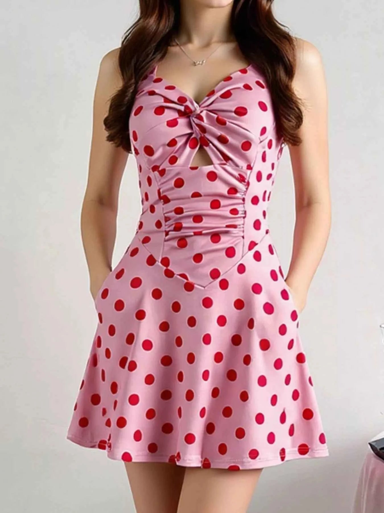 Polka Dot Halter Neck Mini Dress with Twisted Front Design