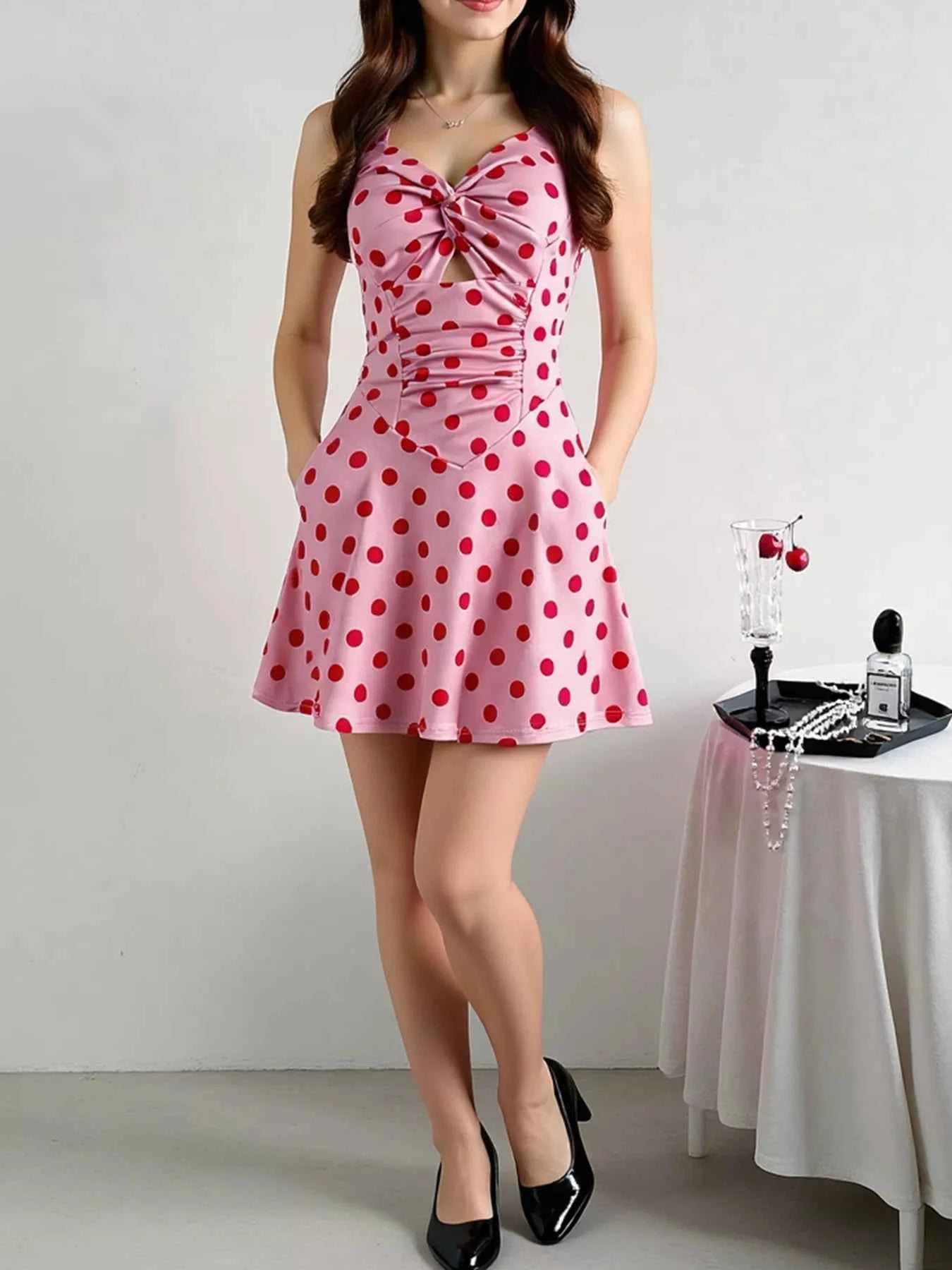 Polka Dot Halter Neck Mini Dress with Twisted Front Design