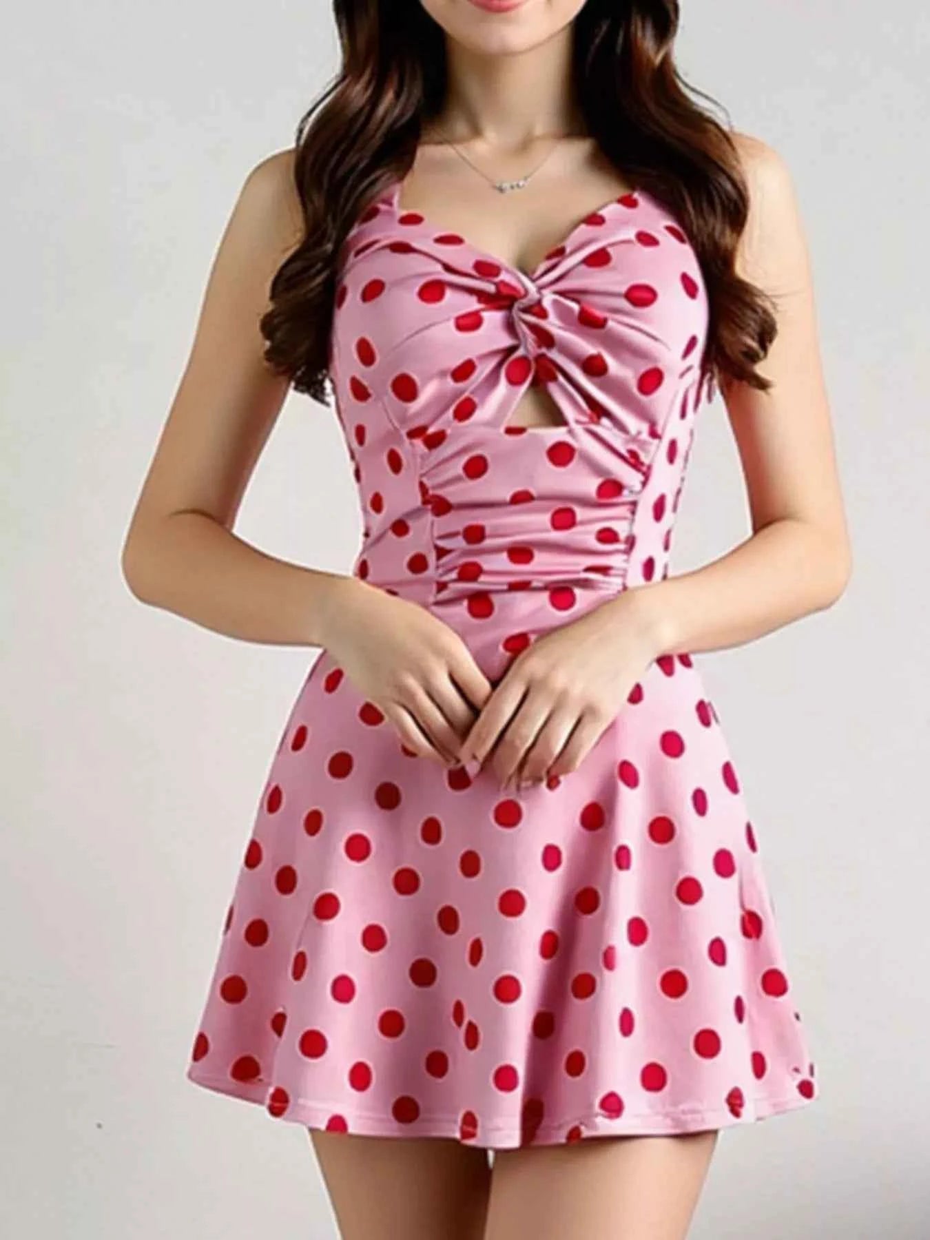 Polka Dot Halter Neck Mini Dress with Twisted Front Design