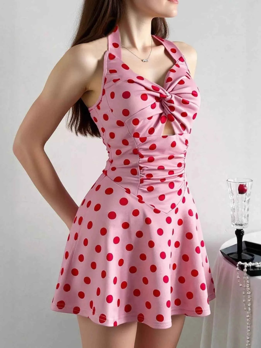 Polka Dot Halter Neck Mini Dress with Twisted Front Design
